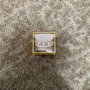 Nicole Miller gold pearl rhinestone stretch bracelet